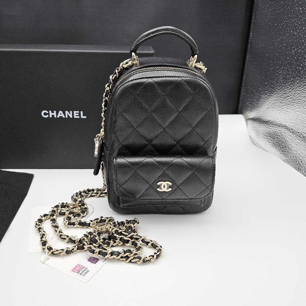 Brand new 24C authentic Chanel mini backpack in caviar leather